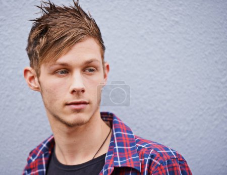 Photo for Haircut, thinking and male person for beauty, trendy and hairstyle on studio background. Face, contemporary and spikes hair from gel for handsome man model, punk and confidence with funky style. - Royalty Free Image