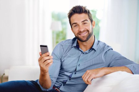 Photo for Business man, phone and portrait for email in home, communication and networking for company. Male person, smile and reading a notification on app for conversation, website and internet for info. - Royalty Free Image