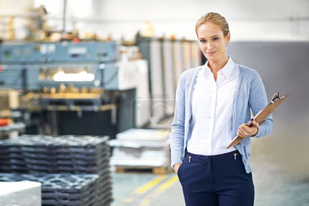 Photo for Business, clipboard and woman in suit in warehouse with production, paperwork and administration. Portrait, female person and confident with stock or information capture in logistics company. - Royalty Free Image