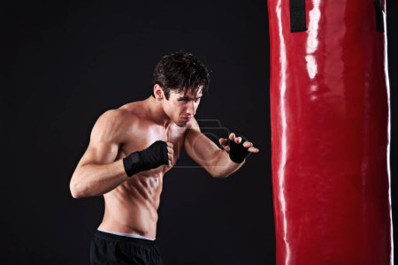 Photo for Man, punching bag or workout with fitness, exercise or fighter with progress or wellness with cardio. Boxer, practice or athlete with training, balance or martial arts with endurance and healthy guy. - Royalty Free Image