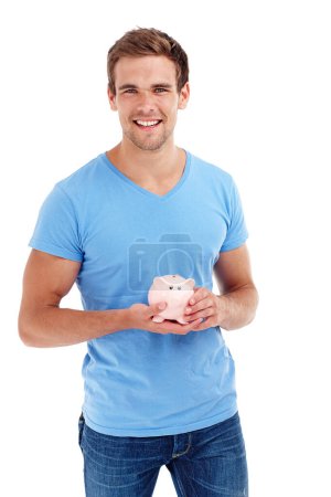 Photo for Portrait, piggy bank and happy man in studio for budget, finance or investment. Face, smile and person with money box for savings, income or security of future profit isolated on a white background. - Royalty Free Image