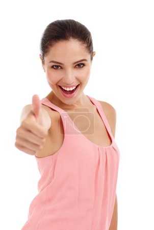 Photo for Woman, portrait and excited with thumbs up for review, feedback or vote for success or support on white background. Hand gesture, yes or like emoji with opinion, pride or praise for agreement. - Royalty Free Image
