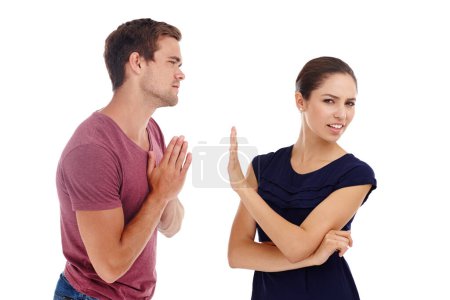 Photo for Divorce, fight and couple in studio with sorry hands for cheating, liar or mistake on white background. Marriage, conflict and people argue with stop palm for frustrated woman with rejection sign. - Royalty Free Image