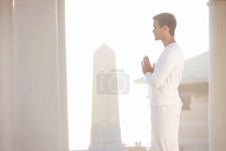 Photo for Man, sun and meditation for yoga outdoor, zen and wellness with prayer hands for spiritual and holistic healing. Calm, peace and natural light with fresh air, mindfulness and energy balance for aura. - Royalty Free Image