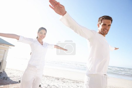 Photo for Yogi couple, pose or beach in mindfulness, practice of meditation as health, fitness or wellness. Man, woman or eyes closed in peace as spiritual, zen or yoga for balance, awareness and gratitude. - Royalty Free Image