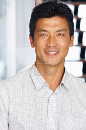 Photo for Portrait, man and smile in creative office, entrepreneur career and workplace. Happy, professional and Asian male person in business, confident staff member and proud Japanese people in workspace. - Royalty Free Image