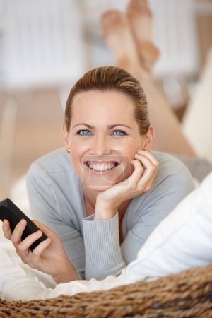 Photo for Relax, phone or portrait of happy woman on couch streaming movie or film on internet or website. Smile, chat or female person in home texting on online on mobile app to search for social media post. - Royalty Free Image