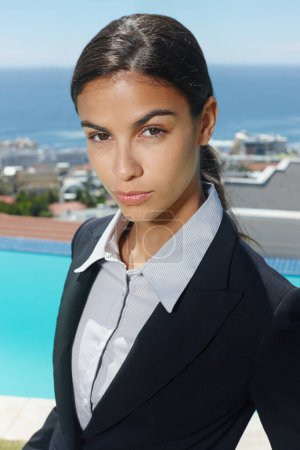 Photo for Businesswoman, portrait and outdoor in suit, corporate and real estate for agency. Female realtor, formal and professional with targets, sales and rentals for properties in Cape Town South Africa. - Royalty Free Image