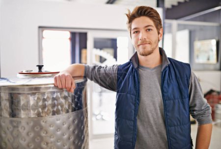 Photo for Brewery, man and portrait with tank in factory with confidence, pride and container machine for manufacturing. Industrial, worker and smile with beer production for alcohol brewing in warehouse. - Royalty Free Image