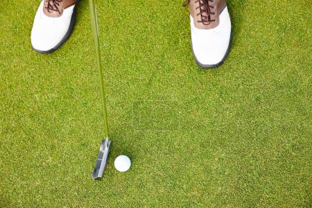 Photo for Shoes, club and golf ball for sports on field, training and practice for competition or tournament. Closeup, feet and driver for outdoor challenge and exercise, top view and professional athlete. - Royalty Free Image