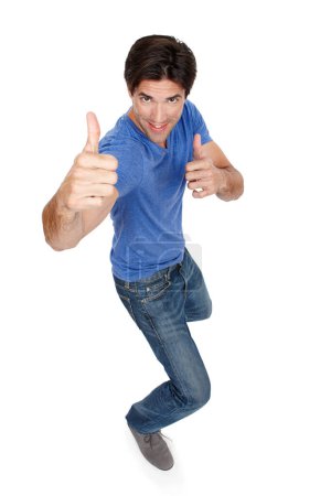 Photo for Man, portrait and thumbs up for approval in studio, yes and motivation for winner on white background. Male person, top view and like emoji for agreement or success, promotion and great or thank you. - Royalty Free Image