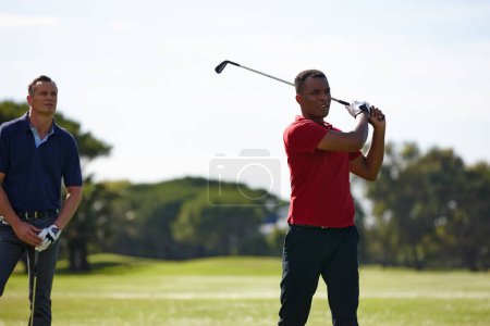 Photo for Friends, men and sport with golf swing for driver training on grass or lawn for recreation at country club. Golfer, Athlete and stroke practice for cardio exercise, hobby and fitness at green field. - Royalty Free Image