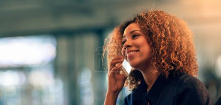 Photo for Happy, business woman and talking in phone call, night and working late, communication and technology. Office, professional and African female person, speaking and smile on face, mobile and network. - Royalty Free Image