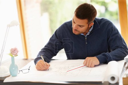 Photo for Man, drawing and architect with pen for design in office, documents and planning on blueprint. Male person, drafting and engineer for building idea on paper, solution and employee for project at desk. - Royalty Free Image