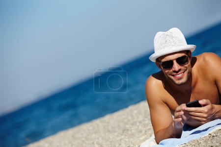 Photo for Man, beach and smartphone in portrait on holiday with ocean on seashore with blue sky in summer for peace. Male person, vacation and relax with phone for memories in cancun with wellness on trip. - Royalty Free Image