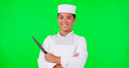 Photo for Woman, chef and portrait with a knife on a green screen with confidence for career or industry. Face of serious asian person or cook with tools for cooking, marketing or advertising for restaurant. - Royalty Free Image