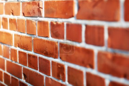 Photo for Building, red and closeup of brick wall in city for texture, background and pattern of exterior structure. Architecture, construction and surface of material, concrete and cement for decoration. - Royalty Free Image