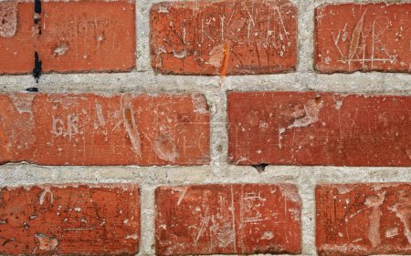 Photo for Red, brick wall and design with cement for texture, concrete pattern and masonry in architecture. Stone, rough and rustic surface with space for building exterior, material or wallpaper background. - Royalty Free Image