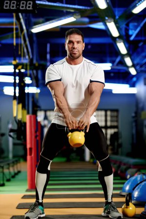 Photo for Fitness, portrait or strong man with kettlebell in workout, training or gym exercise for grip strength. Body builder, bodybuilding or healthy athlete lifting weights for energy, challenge or balance. - Royalty Free Image