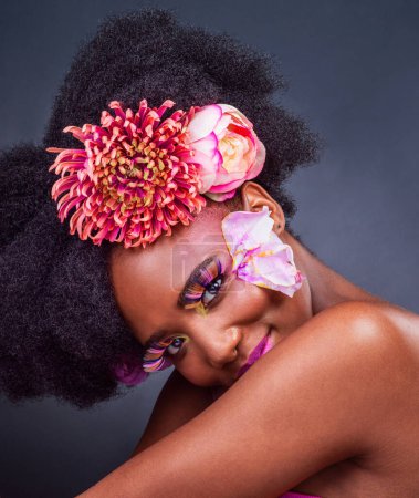 Photo for Eyes, flowers and lashes with portrait of black woman in studio on dark background for natural cosmetics. Afro, beauty and face of young model with spring protea in hair for aesthetic wellness at spa. - Royalty Free Image