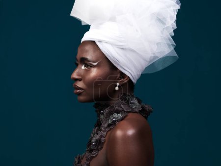 Photo for Profile, fashion and black woman with makeup, beauty and confidence on dark studio background. Face, head wrap and African model with traditional outfit, eyeshadow cosmetics and creative with glamour. - Royalty Free Image