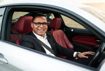 Portrait, mature man and happy with driving car as business person to test drive, experience and comfort. Vehicle, dealership and smile or satisfied with choice, features and safety as present.