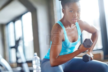 Photo for Black woman, weight lifting and portrait in gym for workout with dumbbell, fitness challenge and strong muscle. Bodybuilder, athlete and strength training with confidence, mockup and power exercise. - Royalty Free Image