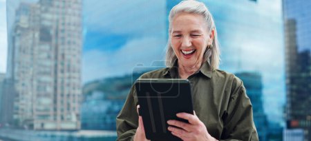 Photo for Senior, woman and laughing with tablet for business outdoor in city with corporate meme or social media joke. Elderly, entrepreneur and comedy with technology for internet scroll or funny web search. - Royalty Free Image