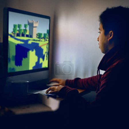 Photo for Gamer, video game and keyboard with mouse for virtual entertainment, online gaming and technology. Young guy or dedicated player and looking at screen with digital animation in fun home challenge. - Royalty Free Image