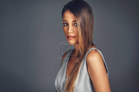 Photo for Hair care, hairstyle and portrait of woman in studio for natural cosmetics, shine and luxury glow on gray background. Elegant, beauty and female model for salon treatment, volume or texture growth. - Royalty Free Image