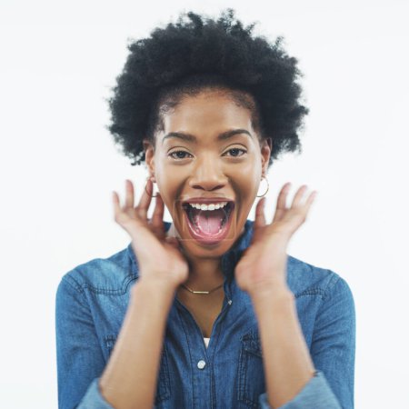 Photo for Black woman, portrait and surprise with afro for winning, good news or prize on a white studio background. Face of happy, excited African or female person with smile for alert, promotion or deal. - Royalty Free Image