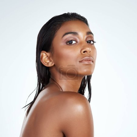 Photo for Studio, portrait and Indian woman with natural beauty from dermatology in mockup space. Face, skincare and girl with confidence from glow on skin or pride from healthy cosmetics in white background. - Royalty Free Image