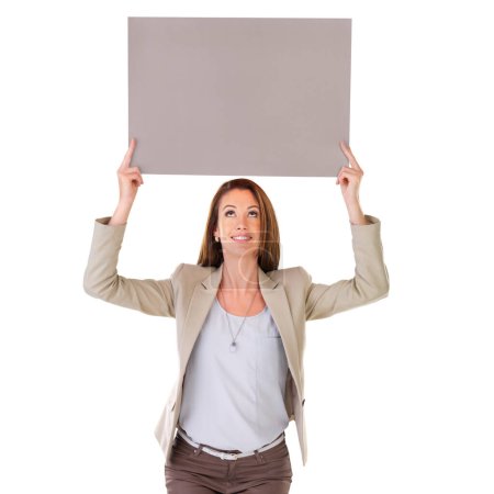 Photo for Poster, looking up and business woman on a white background for information, announcement and news. Professional, happy and isolated person with banner, billboard and sign for mockup space in studio. - Royalty Free Image