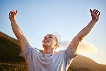 Photo for Outdoor, man and fitness with celebration, nature and excited with victory and workout for wellness. Person, outside and athlete with training, motivation and winner with confidence or exercise goals. - Royalty Free Image
