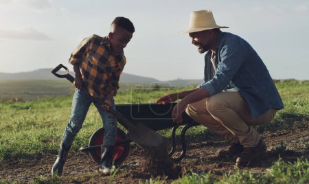 Photo for Farm, agriculture and father and child help for farming, planting vegetables and dig in soil. Black family, nature and dad with young boy for sustainability, growth and agribusiness in countryside. - Royalty Free Image