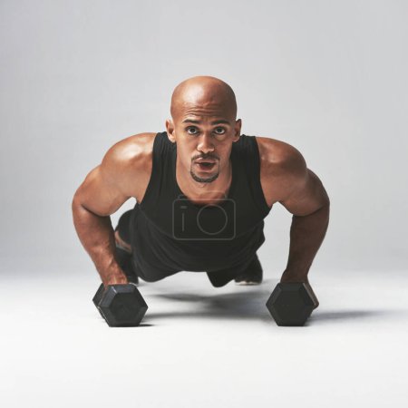 Photo for Plank, portrait and black man with dumbbells for fitness, exercise and wellness for sport isolate on white background. Commitment, training and athlete with motivation for workout, health and cardio. - Royalty Free Image