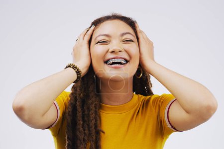 Photo for Smile, hands and portrait of woman in studio for announcement, compliment or good news with braces. Female person, happy and reaction with surprise for giveaway, promo or deal and on white background. - Royalty Free Image