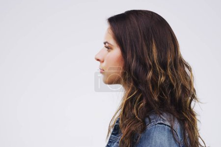 Photo for Thinking, profile and woman serious in studio, isolated and white background for concentration with vision for future. Female student, focused and self reflection, thoughtful and contemplation - Royalty Free Image