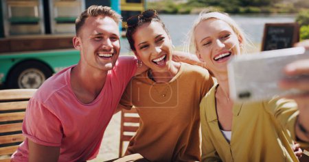 Photo for Smile, friends and selfie with smartphone outdoor for bonding, profile picture or update for social media. Happy people, man and women for photo memories, image moment and weekend trip with mobile. - Royalty Free Image