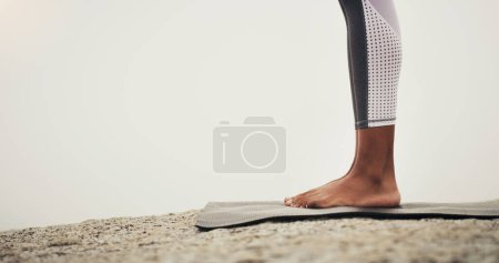 Photo for Rock, yoga or feet of person in outdoor meditation for wellness, peace and mindfulness in nature. Mockup space, mat or spiritual yogi on ground in Miami, USA for awareness, legs or chakra balance. - Royalty Free Image