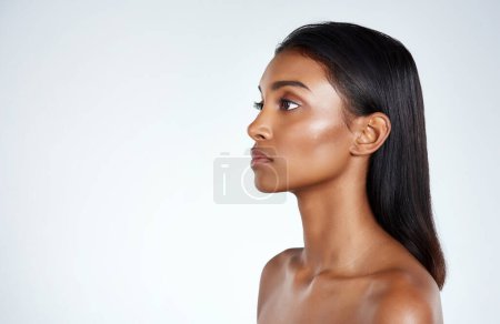 Photo for Profile, beauty and face for Indian woman, mockup and cosmetic or makeup. Cosmetology, spa and beautician for confident female model in studio, salon and treatment for skincare or wellness aesthetic. - Royalty Free Image