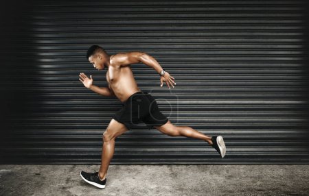 Photo for Shirtless, African man or run at speed, fitness or vision of exercise, energy or thinking of health. Fast, muscular or male runner as planning, idea or dream of cardio, training or power performance. - Royalty Free Image