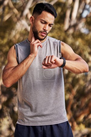 Photo for Pulse, neck and man or runner outdoor for morning cardio, exercise and training for marathon or race. Male athlete, smart watch or stopwatch to track heart rate for workout, wellness and check time - Royalty Free Image