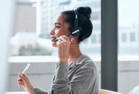 Technical support, computer and woman consultant in office for online crm consultation or enquiries. Telemarketing, headset and female call center or customer service agent with desktop in workplace