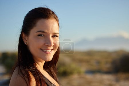 Photo for Happy, woman and portrait outdoor with hike and smile from eco friendly travel in Minnesota on holiday. Fitness, wellness and nature with relax traveler on vacation in summer with adventure on break. - Royalty Free Image
