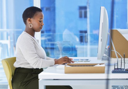 Photo for Computer, typing and black woman in office for creative research with copywriting project. Technology, career and professional African female writer typing email for content on desktop in workplace - Royalty Free Image