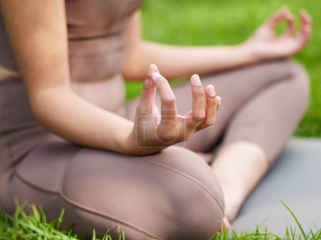 Photo for Woman, hands and meditation with yoga in garden for mindfulness, holistic zen and balance on lawn. Nature yogi, person and relax for pilates with breathing, wellness or mental health outdoor in park. - Royalty Free Image