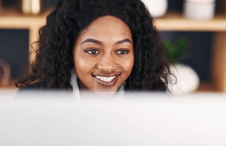 Photo for Lawyer, happy or black woman on computer for legal advice, consulting and networking at law firm. Smile, policy research or African attorney on internet for technology, schedule and feedback review. - Royalty Free Image