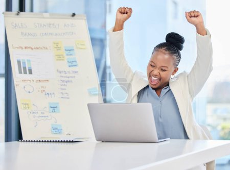 Photo for Woman, laptop and cheers with fist in office, smile and sales performance for profit, win or goals. Black business person, computer and celebration for success with presentation, whiteboard or review. - Royalty Free Image