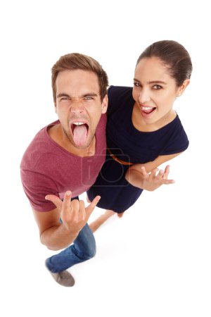 Photo for Portrait, fun or couple with horn gesture, hands or energy in studio for metal celebration from above on white background. Rock and roll, face or people with emoji for party, festival or concert. - Royalty Free Image
